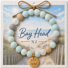 Load image into Gallery viewer, Carded Bay Head Goldtone Beach Tag Amazonite Beaded Bracelet with twine bow
