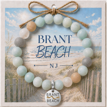 Load image into Gallery viewer, Carded Brant Beach Silvertone Beach Tag Amazonite Beaded Bracelet with twine bow
