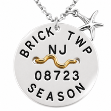 Load image into Gallery viewer, A silvertone Brick Twp NJ Beach Tag necklace with starfish charm