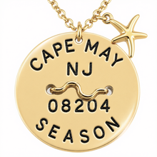 Load image into Gallery viewer, A goldtone Cape May NJ beach tag necklace with starfish