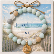 Load image into Gallery viewer, Carded Loveladies Goldtone Beach Tag Amazonite Beaded Bracelet with twine bow