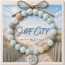 Load image into Gallery viewer, Carded Surf City Silvertone Beach Tag Amazonite Beaded Bracelet with twine bow
