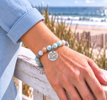 Load image into Gallery viewer, Amazonite Brant Beach tag bracelet in silvertone worn by the ocean