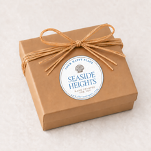 Load image into Gallery viewer, A kraft jewelry box with raffia ribbon for beach jewelry collection of Seasie Heights, NJ