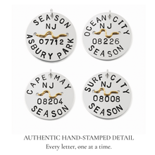 Load image into Gallery viewer, Four authentic hand-stamped beach tag pendants for Asbury Park, Ocean City, Cape May, and Surf City
