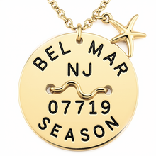Load image into Gallery viewer, A gold-toned round Belmar NJ beach tag pendant necklace engraved with 'BEL MAR NJ 07719 SEASON' and a starfish charm, shown on a white background.
