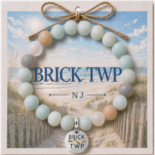 Load image into Gallery viewer, Carded Brick Twp Silvertone Beach Tag Amazonite Beaded Bracelet with twine bow
