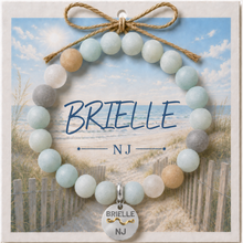 Load image into Gallery viewer, Carded Brielle NJ Silvertone Beach Tag Amazonite Beaded Bracelet with twine bow
