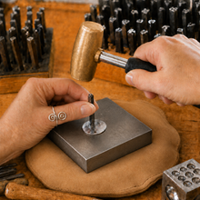 Load image into Gallery viewer, Artist Metalsmith showing hand stamping process
