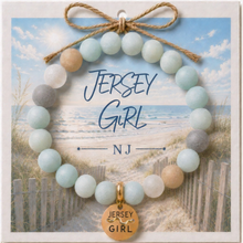 Load image into Gallery viewer, Carded Jersey Girl Goldtone Beach Tag Amazonite Beaded Bracelet with twine bow
