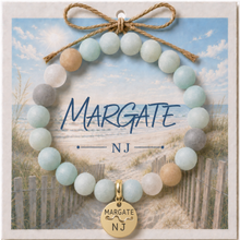 Load image into Gallery viewer, Carded Margate NJ Goldtone Beach Tag Amazonite Beaded Bracelet with twine bow
