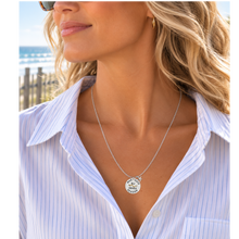 Load image into Gallery viewer, A woman at the beach wearing a necklace that has a starfish and beach badge pendant of Margate, NJ
