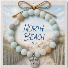 Load image into Gallery viewer, Carded North Beach Silvertone Beach Tag Amazonite Beaded Bracelet with twine bow
