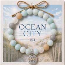Load image into Gallery viewer, Carded Ocean City Silvertone Beach Tag Amazonite Beaded Bracelet with twine bow

