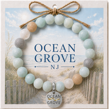 Load image into Gallery viewer, Carded Ocean Grove Silvertone Beach Tag Amazonite Beaded Bracelet with twine bow
