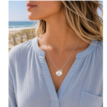 Load image into Gallery viewer, A woman at the beach wearing a necklace that has a starfish and beach badge pendant of Seasie Heights, NJ
