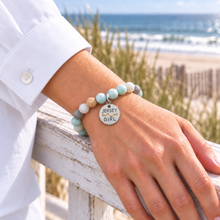 Load image into Gallery viewer, Amazonite Jersey Girl beach tag bracelet in silvertone worn by the ocean
