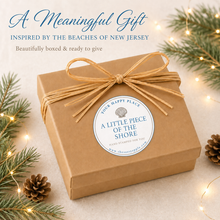 Load image into Gallery viewer, Kraft jewelry gift box with raffia bow and holiday greenery for nj beach tag jewelry
