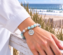 Load image into Gallery viewer, Amazonite North Beach tag bracelet in silvertone worn by the ocean
