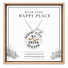 Load image into Gallery viewer, A carded Ocean City, NJ Beach tag pendant on necklace with starfish in box
