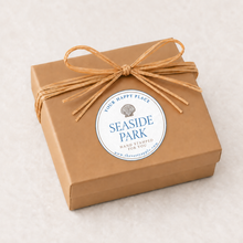 Load image into Gallery viewer, A kraft jewelry box with raffia ribbon for beach jewelry collection of Seaside Park, NJ
