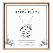 Load image into Gallery viewer, A carded Spring Lake, NJ Beach tag pendant on necklace with starfish in box
