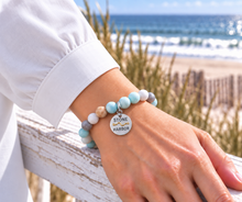 Load image into Gallery viewer, Amazonite Stone Harbor beach tag bracelet in silvertone worn by the ocean
